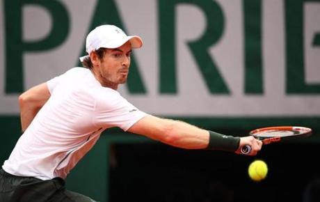 PARIS FRANCE- JUNE 01 Andy Murray of Great Britain hits a backhand during the Men's Singles quarter final match against Richard Gasquet of France on day eleven of the 2016 French Open at Roland Garros