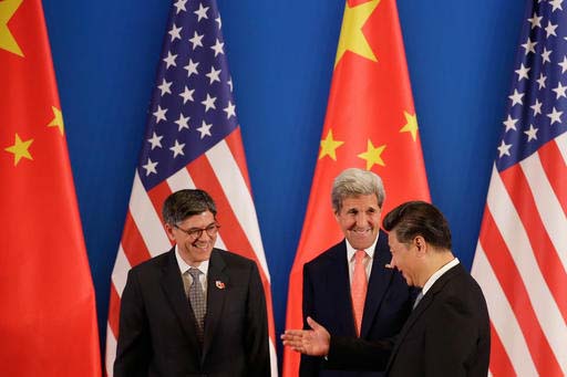 China's President Xi Jinping right chats with U.S. Secretary of State John Kerry center and U.S. Treasury Secretary Jacob Lew left during the Joint Opening Ceremony of the 8th U.S.-China Strategic and Economic Dialogues and the 7th U.S.-China High-L