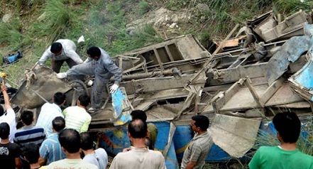 Bus skids off mountain road in northeast India, killing 25