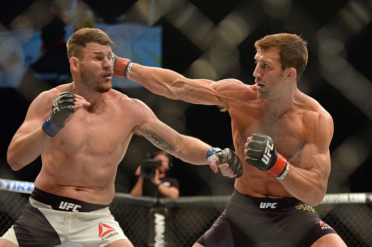 Jake Roth  USA Today Sports   Michael Bisping blue gloves fights Luke Rockhold during UFC 199 at The Forum on Saturday