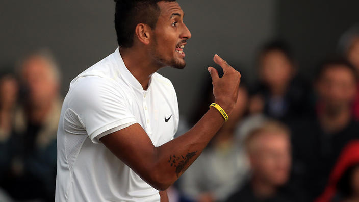 A British tabloid reporter has baited Nick Kyrgios into an awkward press conference exchange