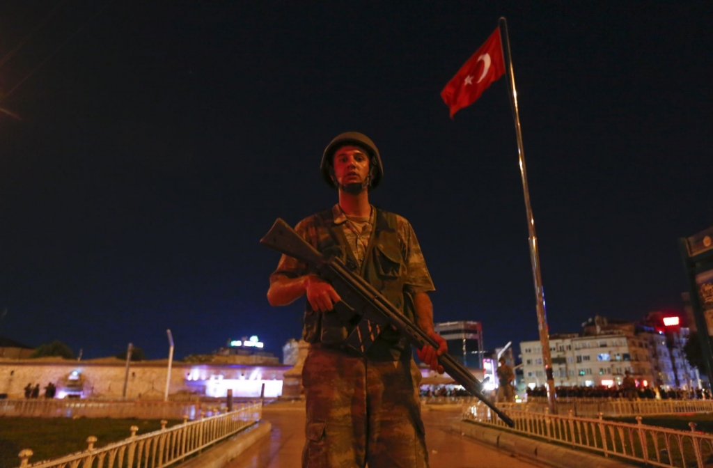 A Turkish military stands guard in the Taksim Square in Istanbul Turkey