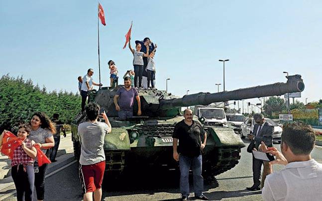 A day after People take selfies on an abandoned tank