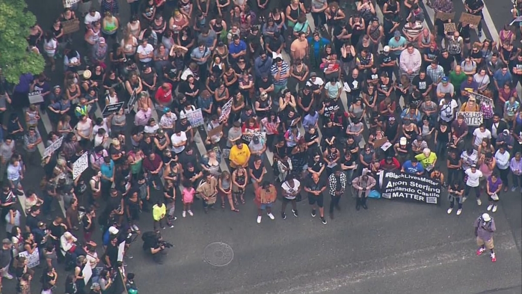 A few hundred Black Lives Matter protesters are blocking traffic in Seattle marching from downtown to Capitol Hill