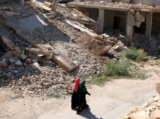 A general view shows damaged buildings in the rebel-held town of Dael in Deraa Governorate Syria on July 7