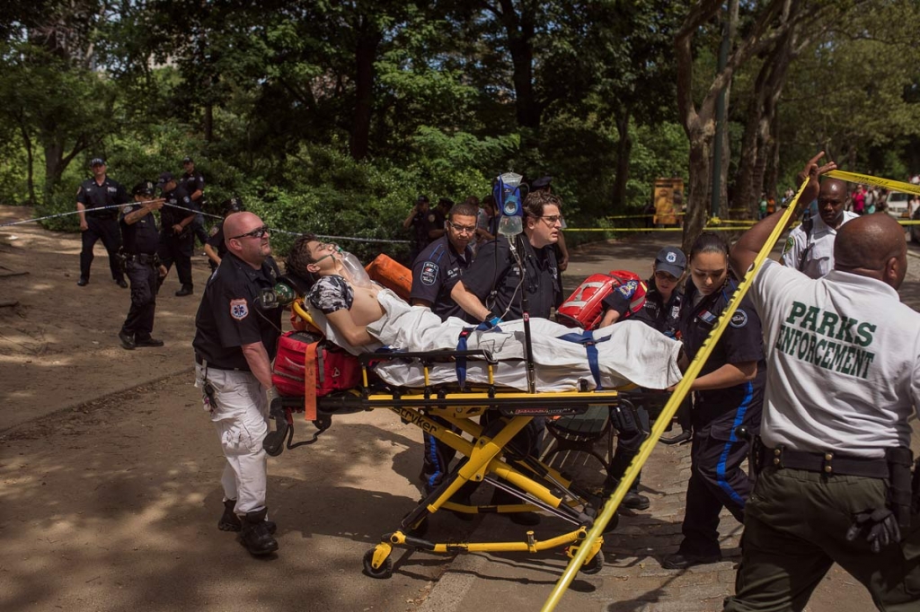 A injured man is carried to an ambulance in Central Park in New York Sunday