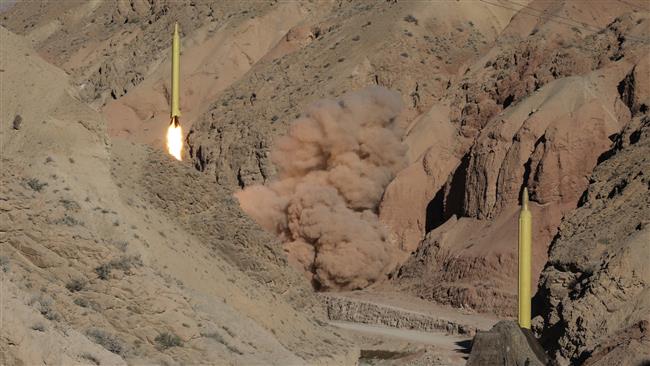 A long-range Qadr ballistic missile is launched in the Alborz mountain range in northern Iran