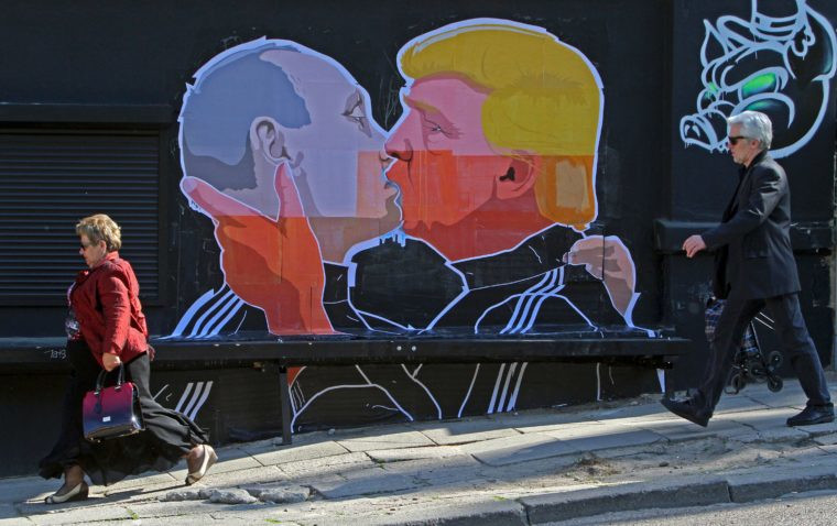 A mural on a restaurant wall depicting US Presidential hopeful Donald Trump and Russian President Vladimir Putin