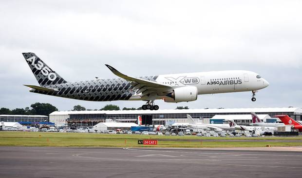 A new Airbus A350 carrying Sir Richard Branson lands at the Farnborough International Airshow in Hampshire