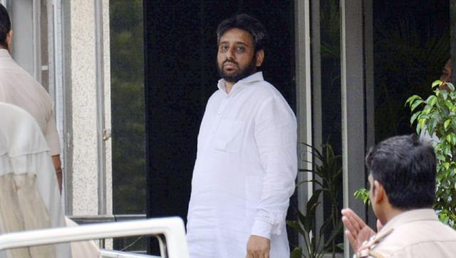 AAP MLA Amanatullah Khan at a police station after his arrest on charges of threatening a woman in New Delhi