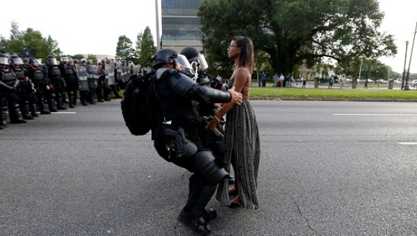 Protester Ieshia Evans is detained by law enforcement near the headquarters of the Baton Rouge Police Department in Baton Rouge Louisiana