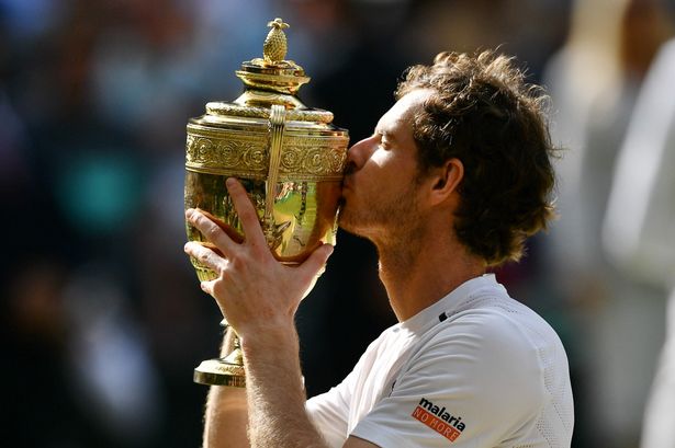 Andy Murray kisses the winner's trophy