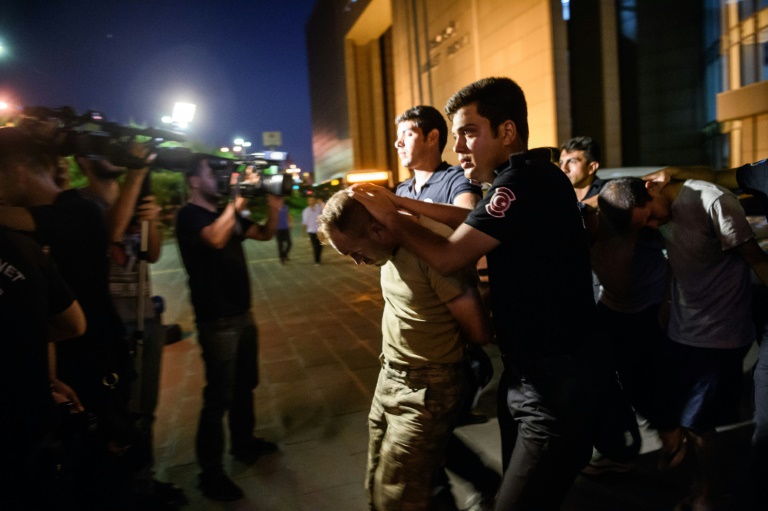 AFP  Ozan Kose Police escort soldiers in a roundup after a military coup in Turkey