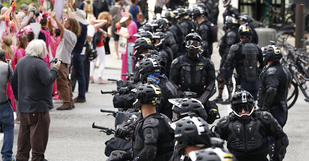 Thousands of police officers from around the country keep the peace in Cleveland