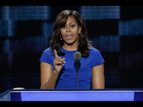 AP     First Lady Michelle Obama speaks during the first day of the Democratic National Convention in Philadelphia on Monday