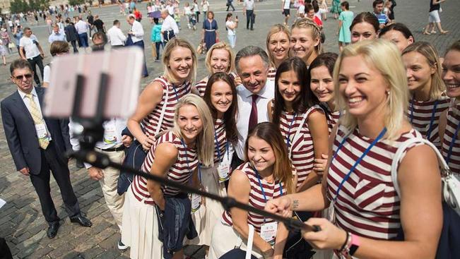 Russian Olympic Team members pose for a selfie in Moscow