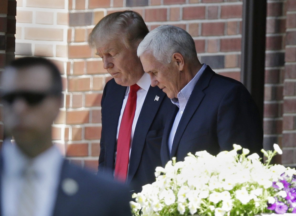 Donald Trump leaves the Indiana Governor’s residence with Gov. Mike Pence in Indianapolis Wednesday