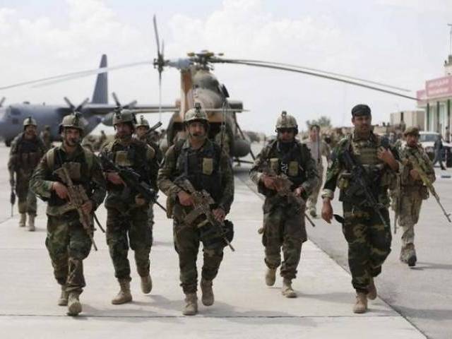 Afghan security forces arrive at the Kunduz airport in Afghanistan