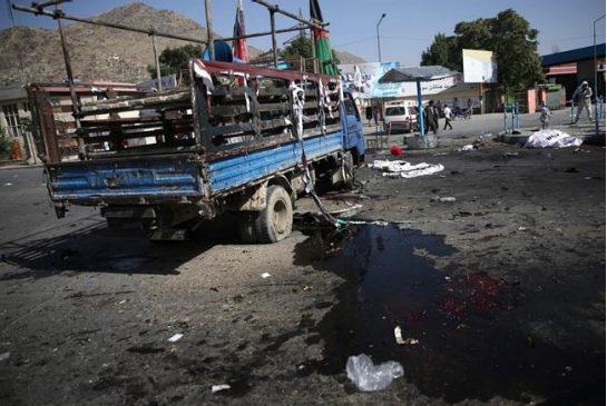 A truck used by some leaders of a protest march is damaged after a deadly explosion that struck a protest march by ethnic Hazaras in Kabul Afghanistan Saturday