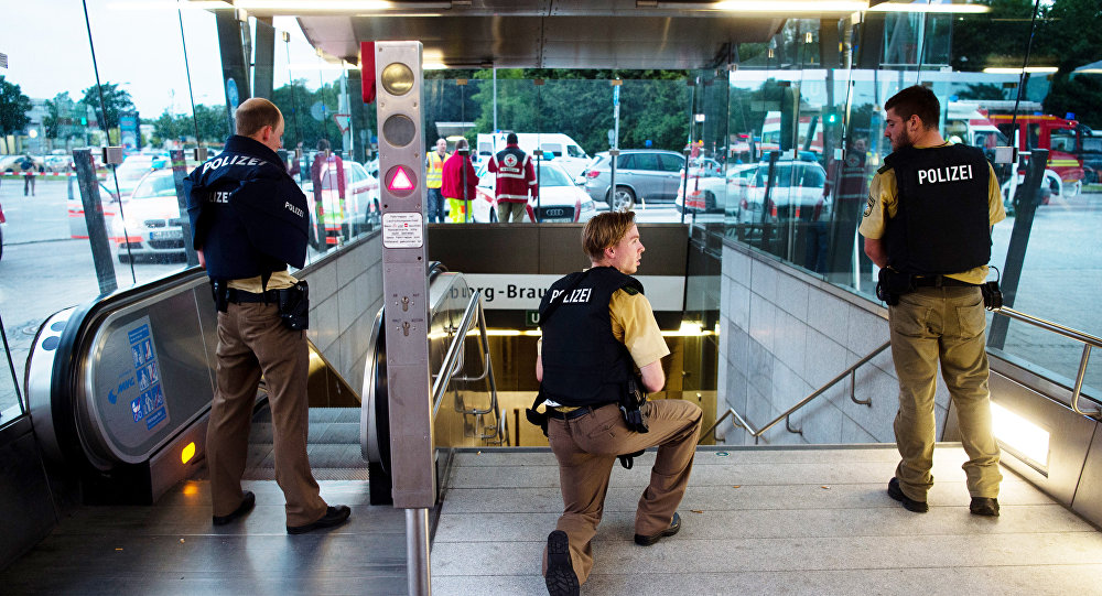 Police secures the entrance to a subway station near a shopping mall where a shooting took place