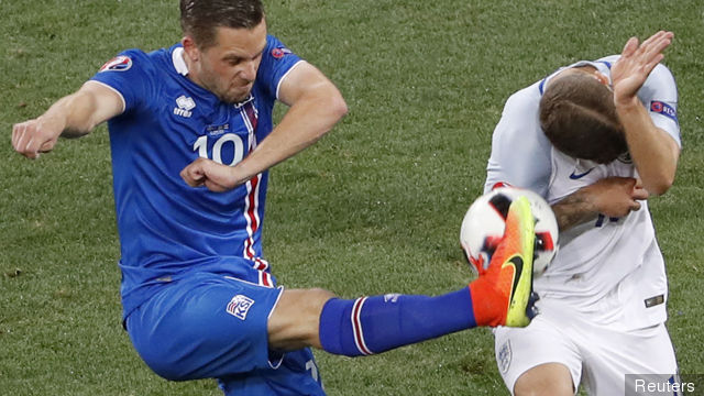 Iceland's Gylfi Sigurdsson in action with England's Jack Wilshere