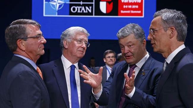 NATO chief Jens Stoltenberg Ukraine’s President Petro Poroshenko UK Defense Secretary Michael Fallon and US Defense Secretary Ashton Carter attend a working session at a NATO summit in Poland