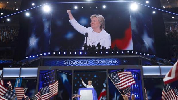 Democratic presidential nominee Hillary Clinton waves after taking the stage during the final day of the Democratic National Convention in Philadelphia, Thursday