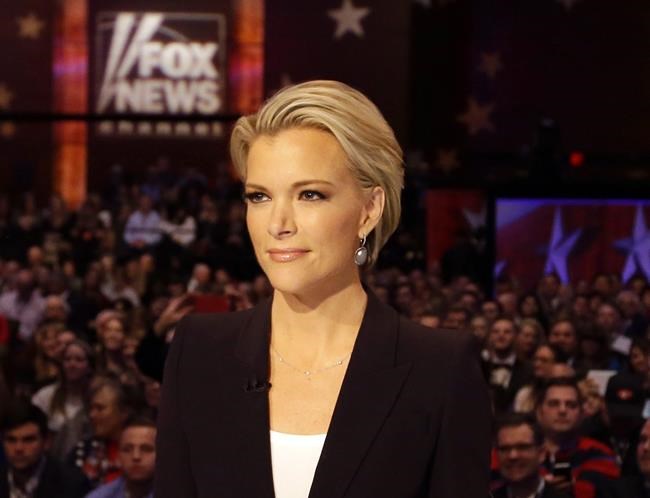 Moderator Megyn Kelly waits for the start of the Republican presidential primary debate in Des Moines Iowa. A lawyer for Roger Ailes is denying that the Fox News Channel chief executive sexually harassed network star M