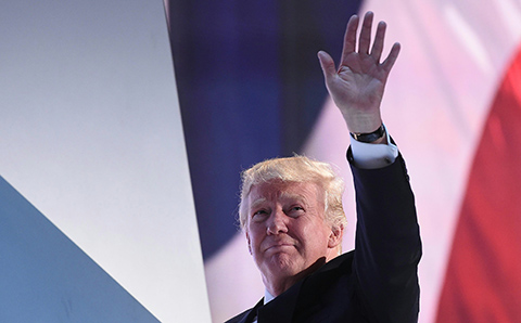 Republican Presidential candidate Donald Trump waves as he leaves the stage during the Republican National Convention at the Quicken Loans Arena in Cleveland Ohio