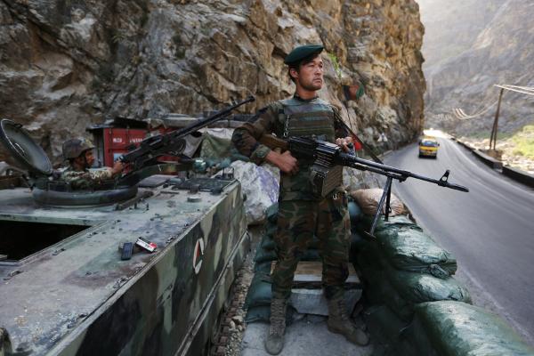 An Afghan soldier guards a checkpoint on July 19 at the Kabul Jalalabad highway on the outskirts of Kabul Afghanistan