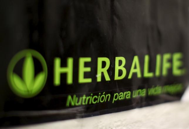 An Herbalife logo is shown on a poster at a clinic in the Mission District in San Francisco California