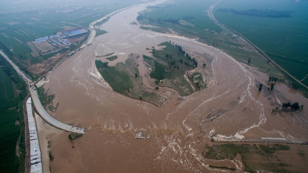 An aerial view shows that roads and fields are flooded in Xingtai Hebei Province China