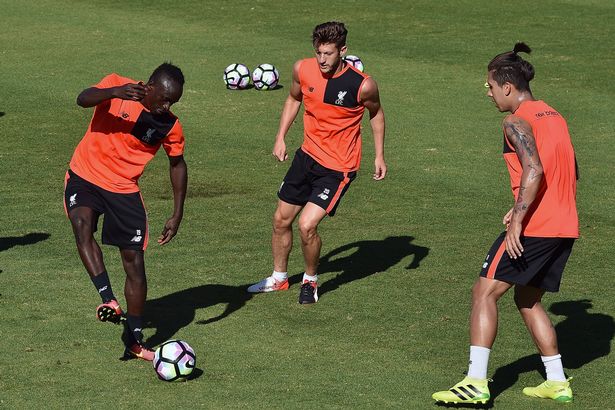 Sadio Mane Adam Lallana and Roberto Firmino training ahead of their match with Chelsea in the International Champions Cup