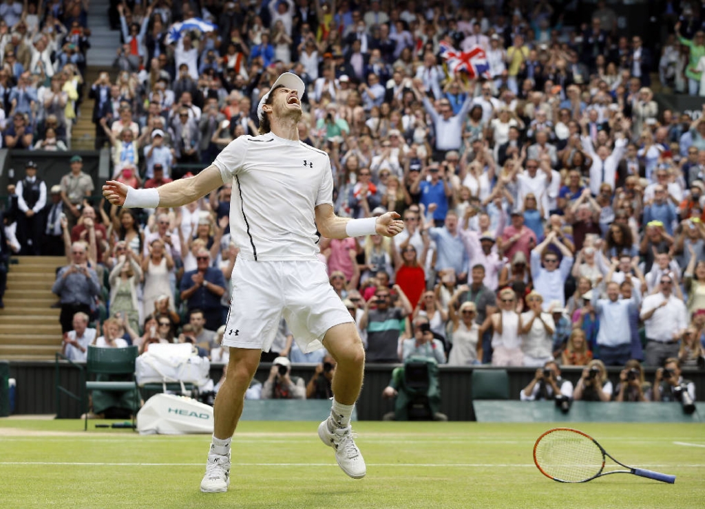 Andy Murray celebrates after beating Milos Raonic to win the Wimbledon men's singles title on Sunday