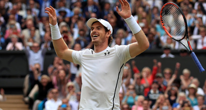 Andy Murray celebrates at match point as he defeats Milos Raonic in the Men's Singles Final at Wimbledon