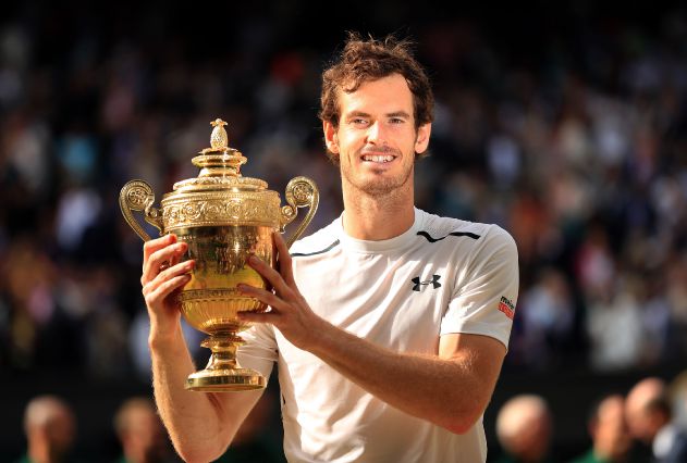 Andy Murray with the trophy after winning the men's singles final against Milos Raoni