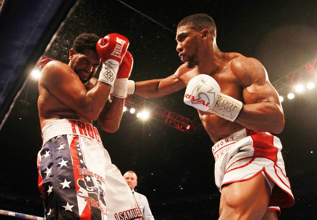 Anthony Joshua retains IBF heavyweight title with 7-round destruction of Dominic Breazeale