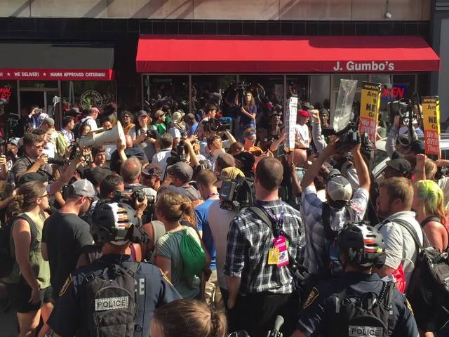 Anti police brutality protesters jump and shout on Euclid Ave.                       WEWS