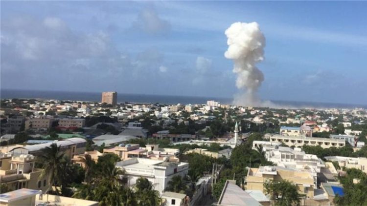 Armed group claims responsibility for attack in capital Mogadishu that targeted base used by AU troops near airport