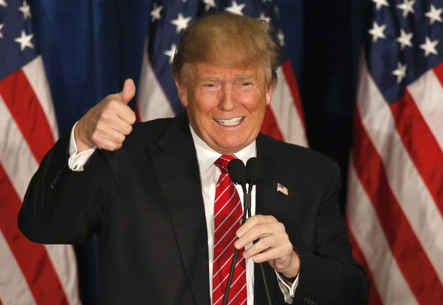 Donald Trump gives a thumbs-up as he speaks at campaign stop in Portland Maine