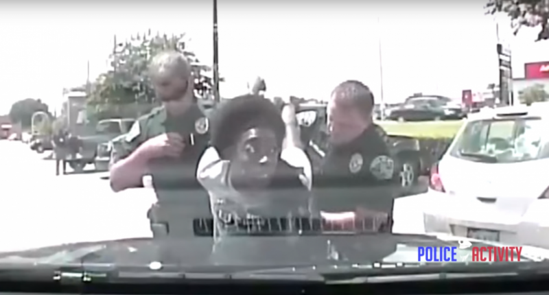 Austin police officers arrest 26-year-old teacher Breaion King in June of 2015 (Screen cap via PoliceActivity