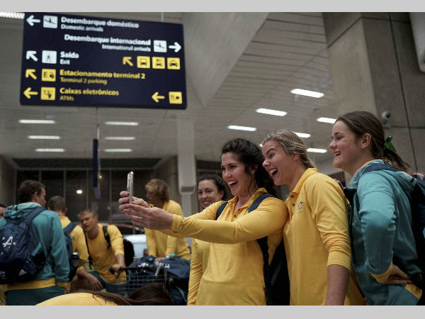 Australia's olympic athletes take a selfie after arriving at the Tom Jobim International Airport in Rio de Janeiro on July 26