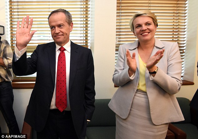 Leader of the Opposition Bill Shorten and Deputy Leader of the Opposition Tanya Plibersek at the Labor Party Caucus meeting at Parliament House in Canberra on Friday- Mr Shorten has all but conceded the Coalition will be returned to power