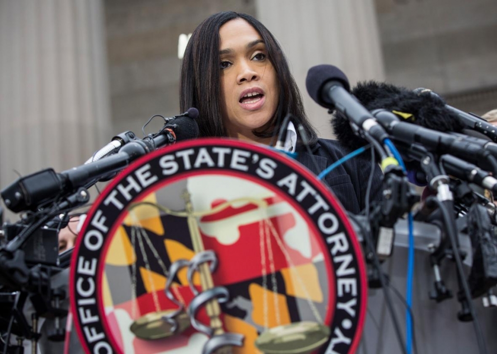 The Latest: Prosecutors drop charges in Freddie Gray case