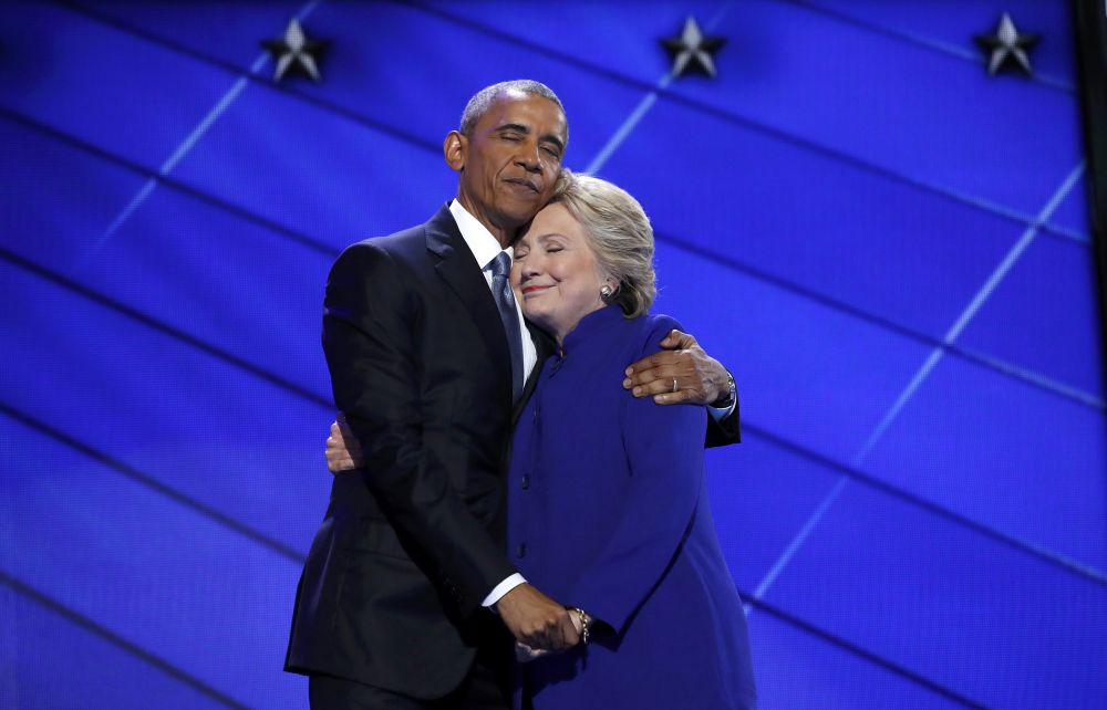 Hillary Clinton hugs President Barack Obama after his rousing speech in Philadelphia