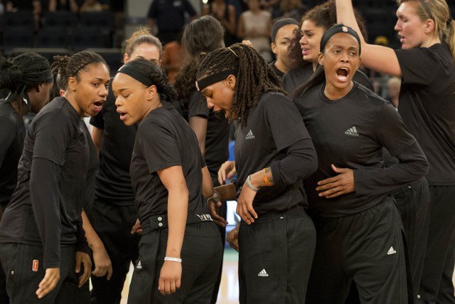 Members of the New York Liberty basketball team shout after a team huddle prior to a game against the Atlanta Dream Wednesday