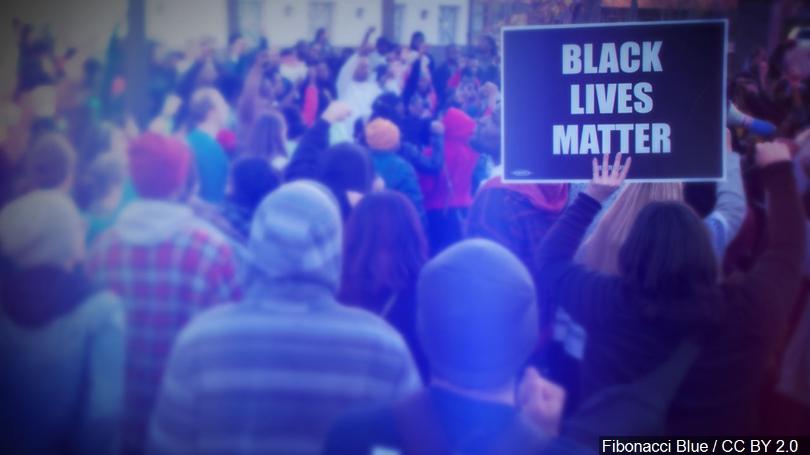 Black Lives Matter protester photo hailed as 'iconic', 'powerful' and 'legendary'