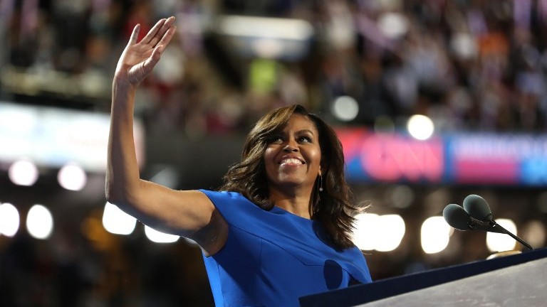 First lady Michelle Obama acknowledges the crowd after delivering remarks on the first day of the Democratic National Convention at the Wells Fargo Center