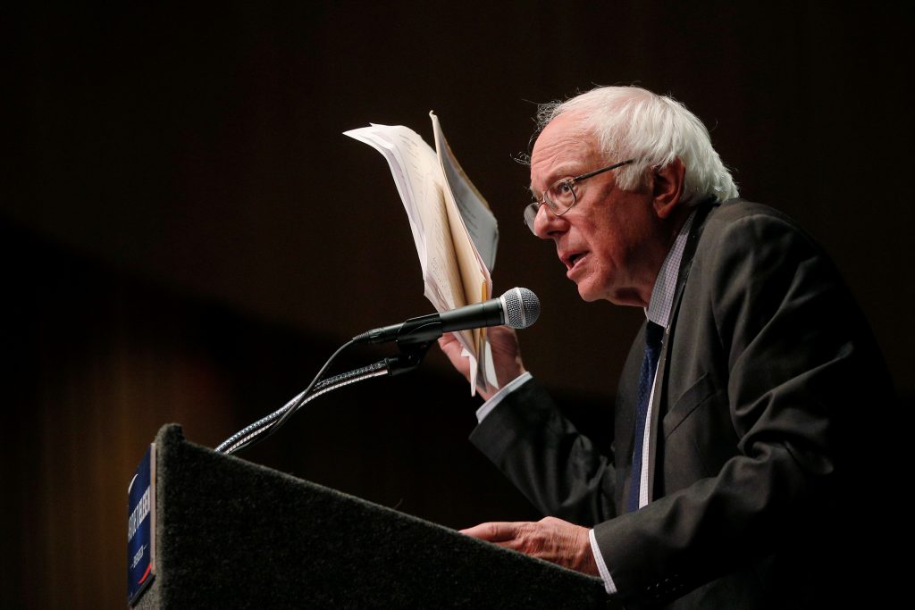 U.S. Democratic presidential candidate and U.S. Senator Bernie Sanders holds up his notes while speaking about his attempts to influence the Democratic party's platform during a speech in Albany New York U.S