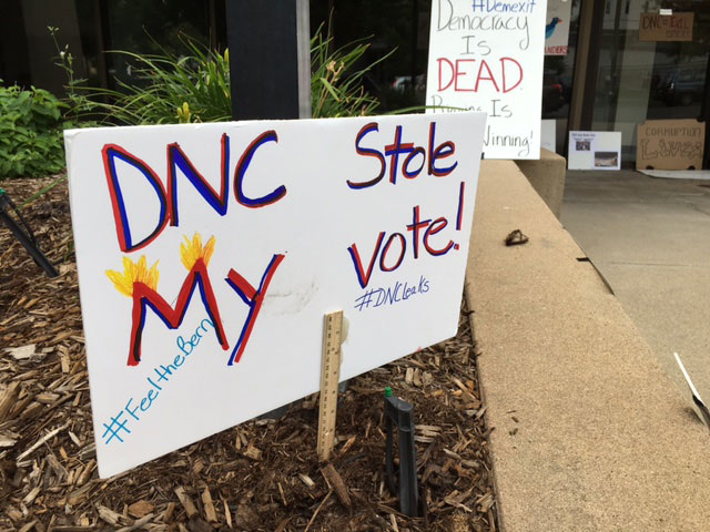 Bernie Sanders supporters plastered the entrance to the Colorado Democratic Party headquarters on Sherman Street in Denver on Sunday